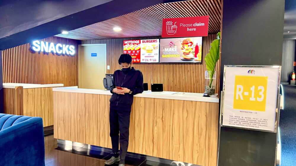 information-counter-snacks-are-distributed-inside-the-cinema-at-directors-club-sm-city-cebu